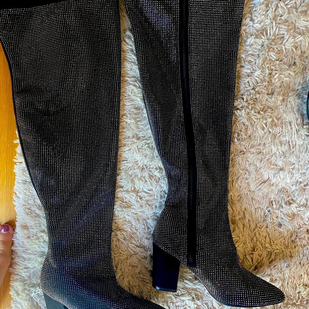 Over the knee sparkle boots.